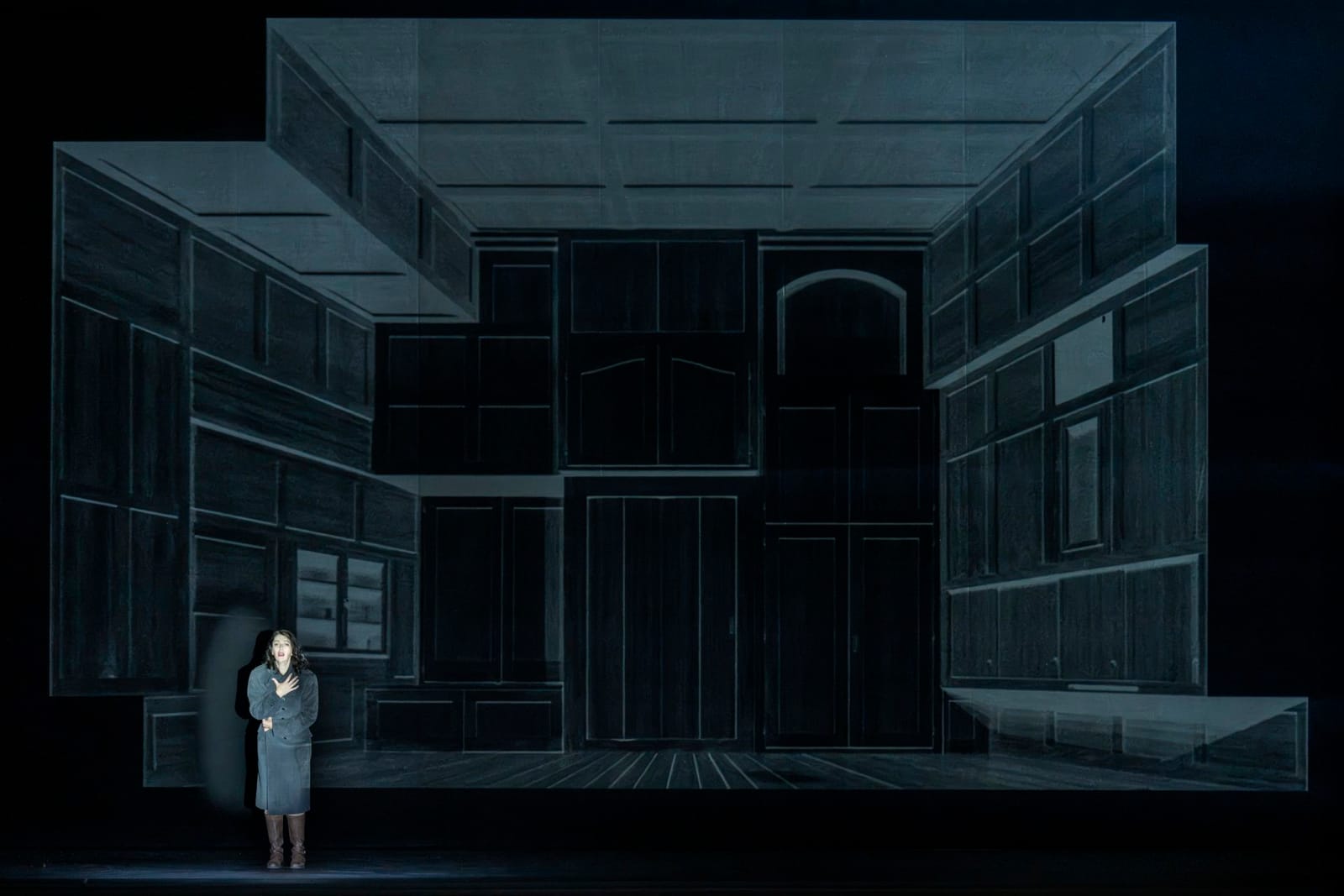 The set in darkness in the final act