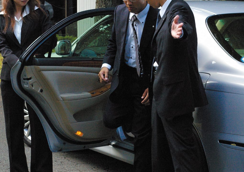 Guards at the car door
