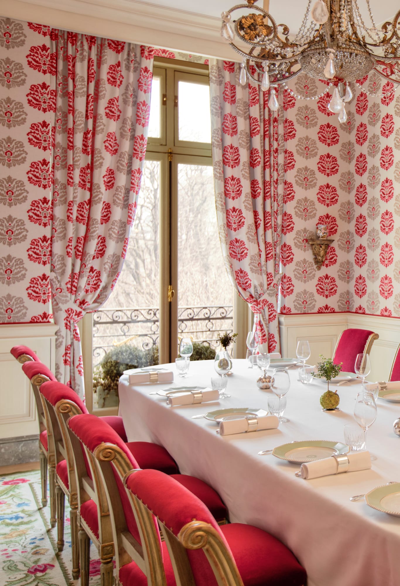 A private room under a rock-crystal chandelier