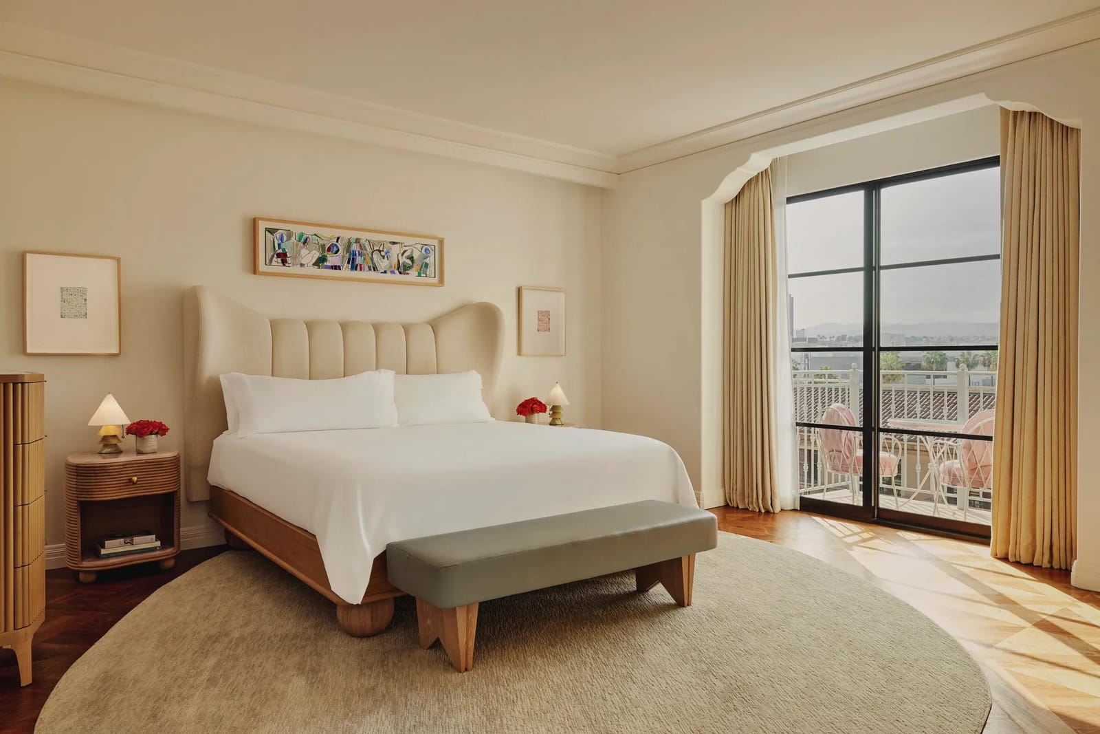 The bedroom, opening to the terrace
