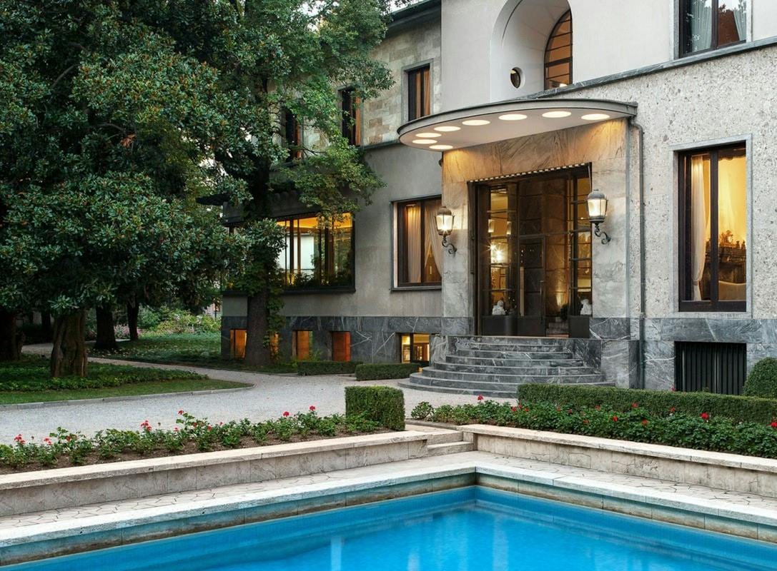 The villa at dusk from the pool