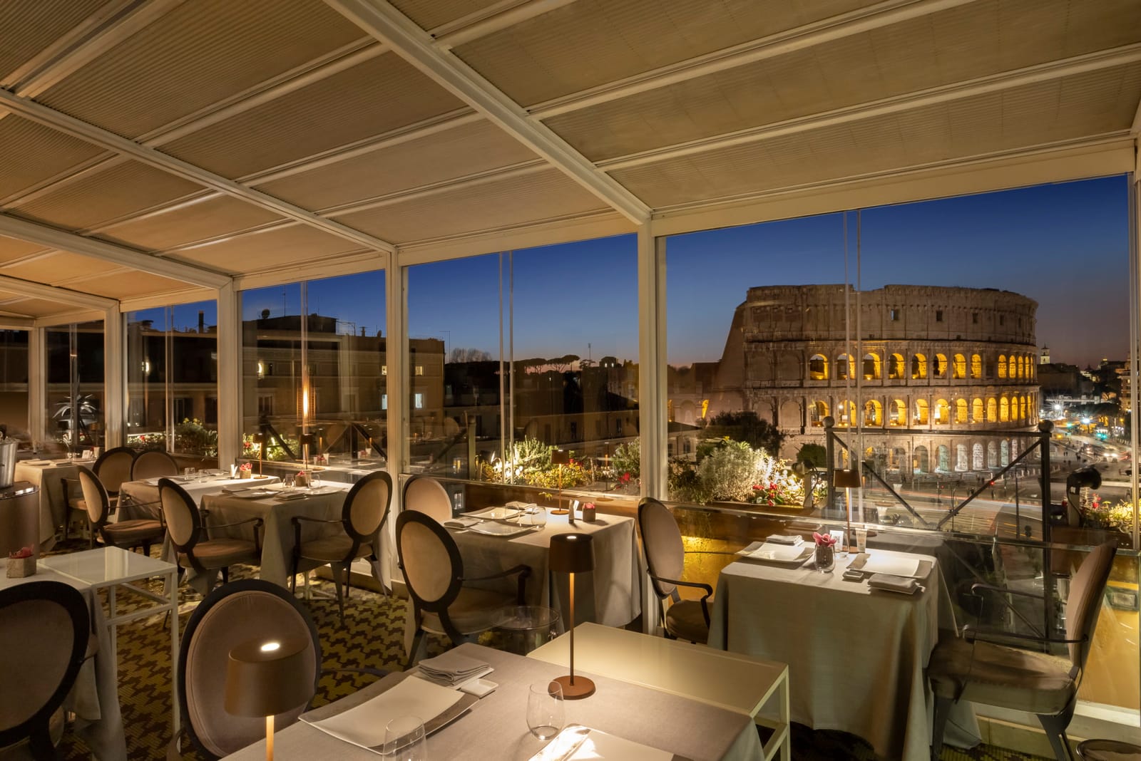 The glass-walled dining room at night