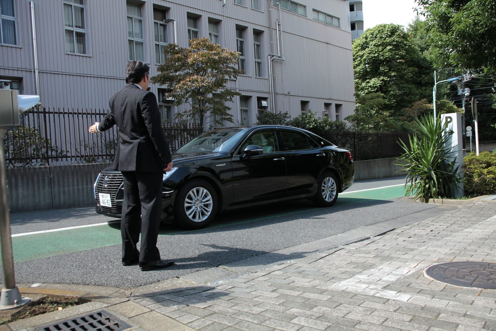 The advance guard directing the car in