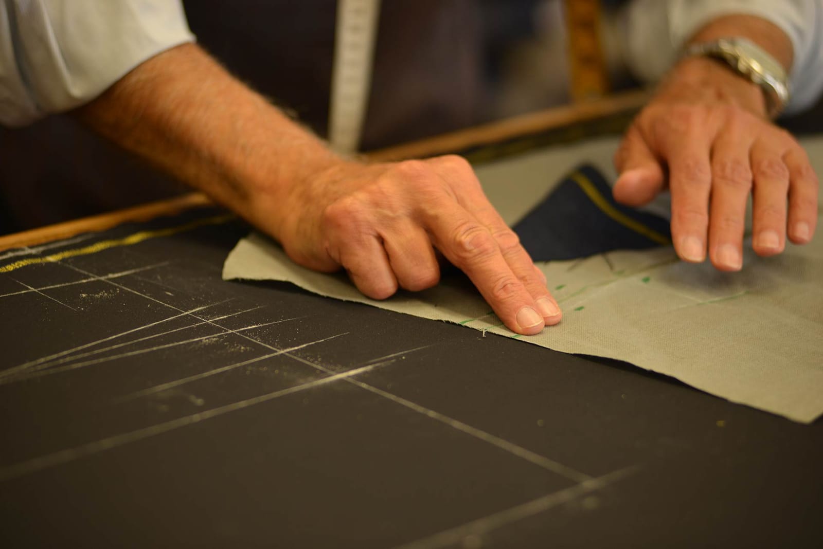 Chalk lines and canvas on the cutting table