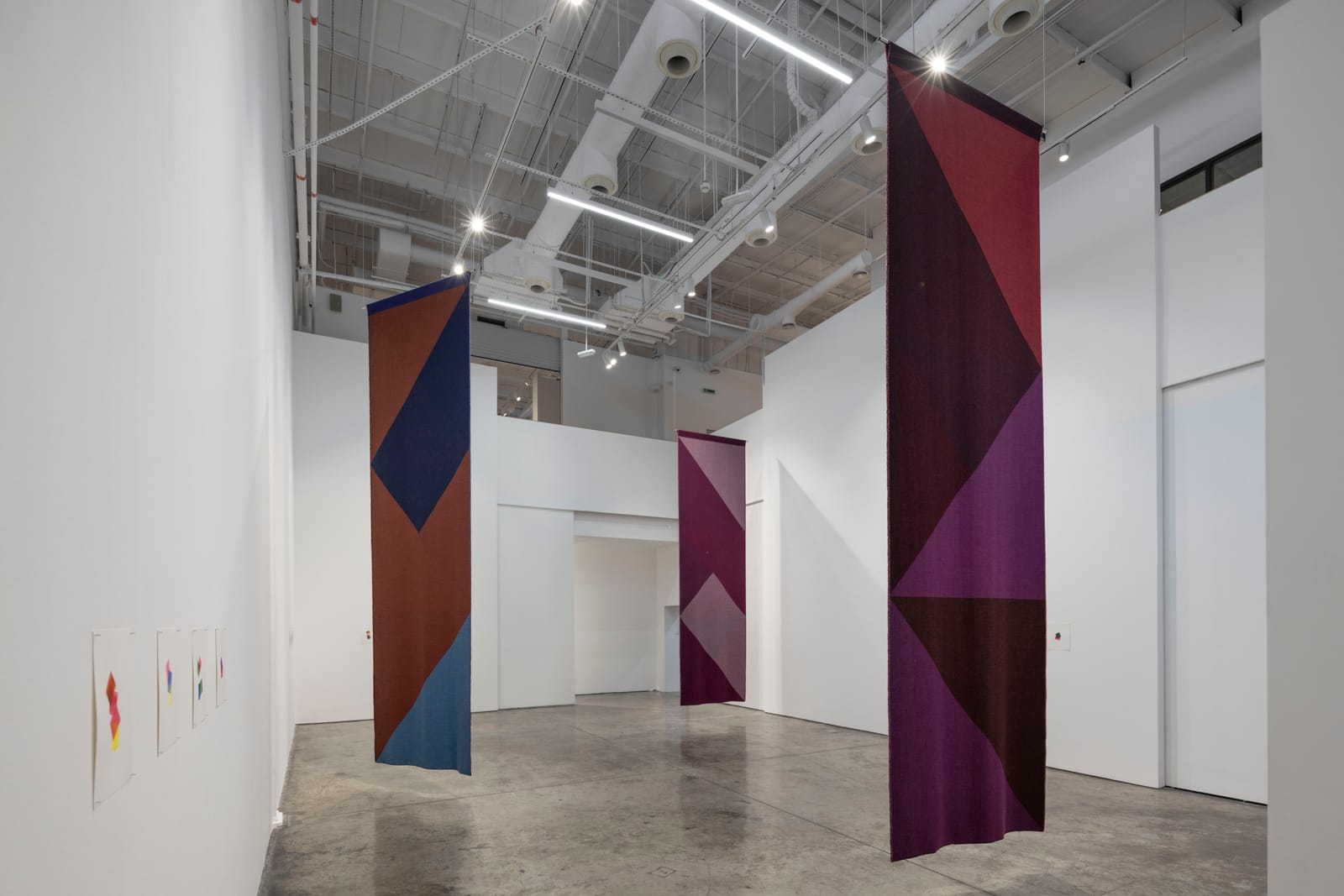 The suspended tapestries in Gallery 1