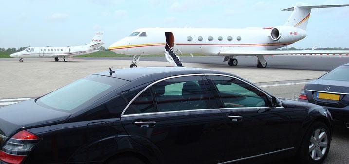 A car waiting at the aircraft steps, airside