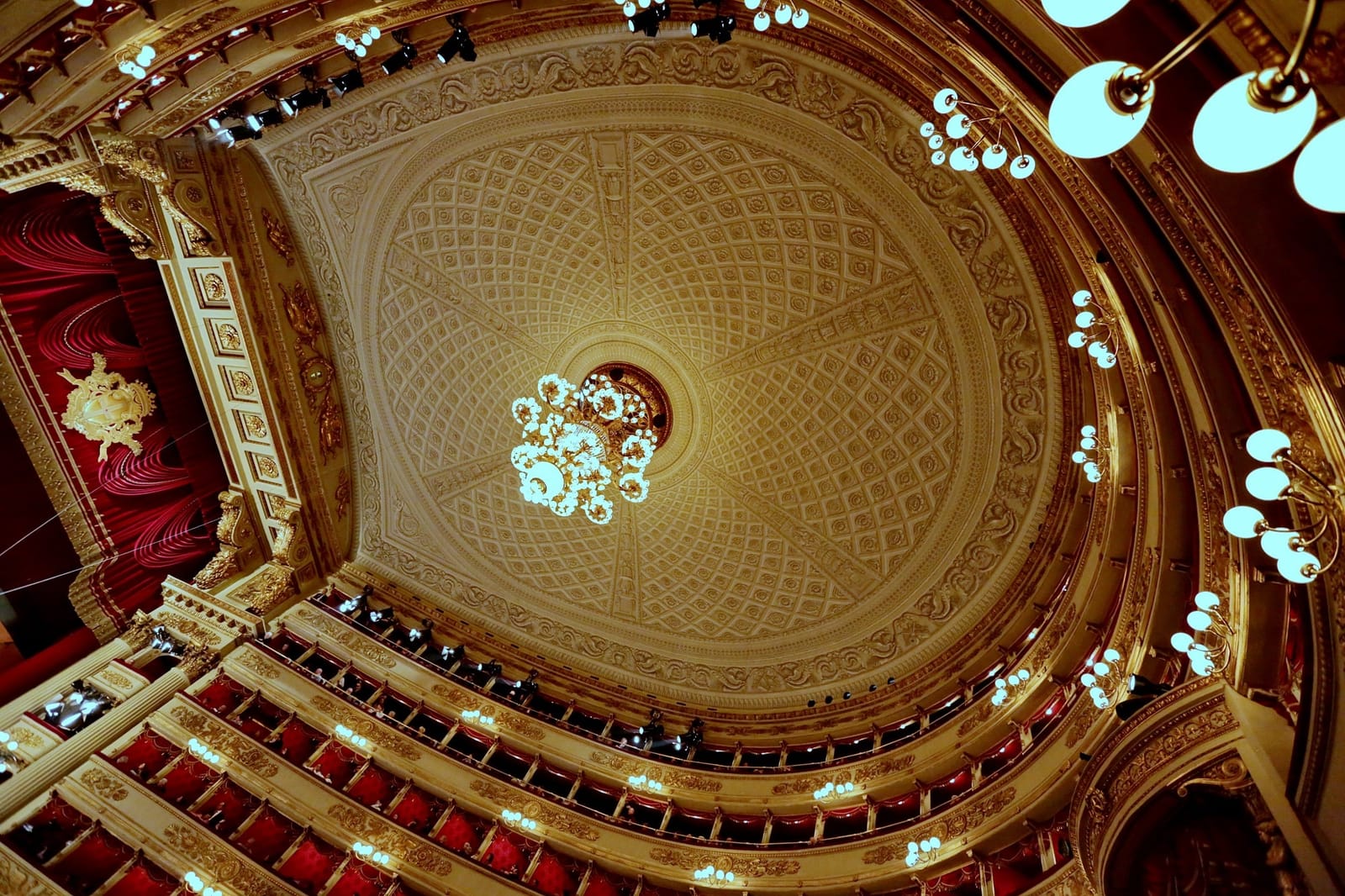 The auditorium ceiling and tiers of boxes