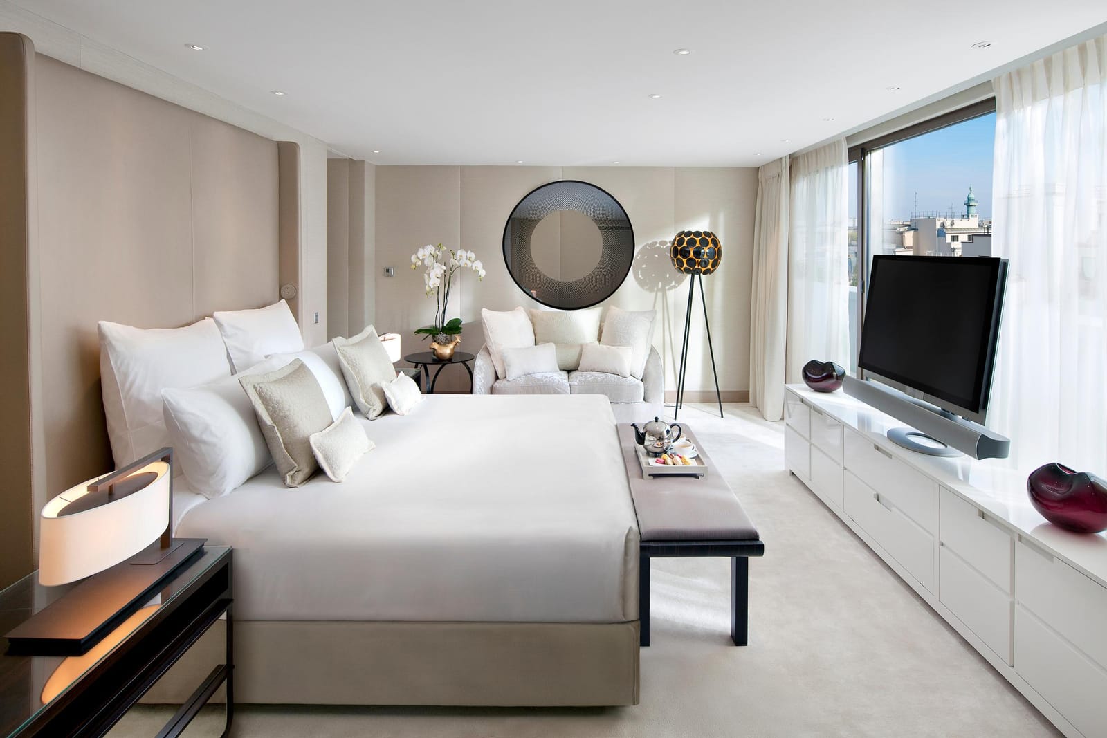 A penthouse bedroom over the rooftops