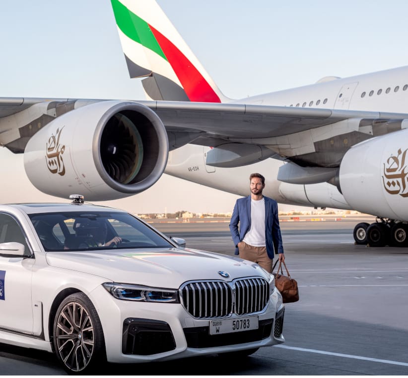 The car at the aircraft