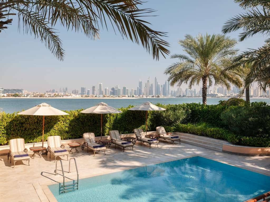 The villa pool and terrace facing the skyline