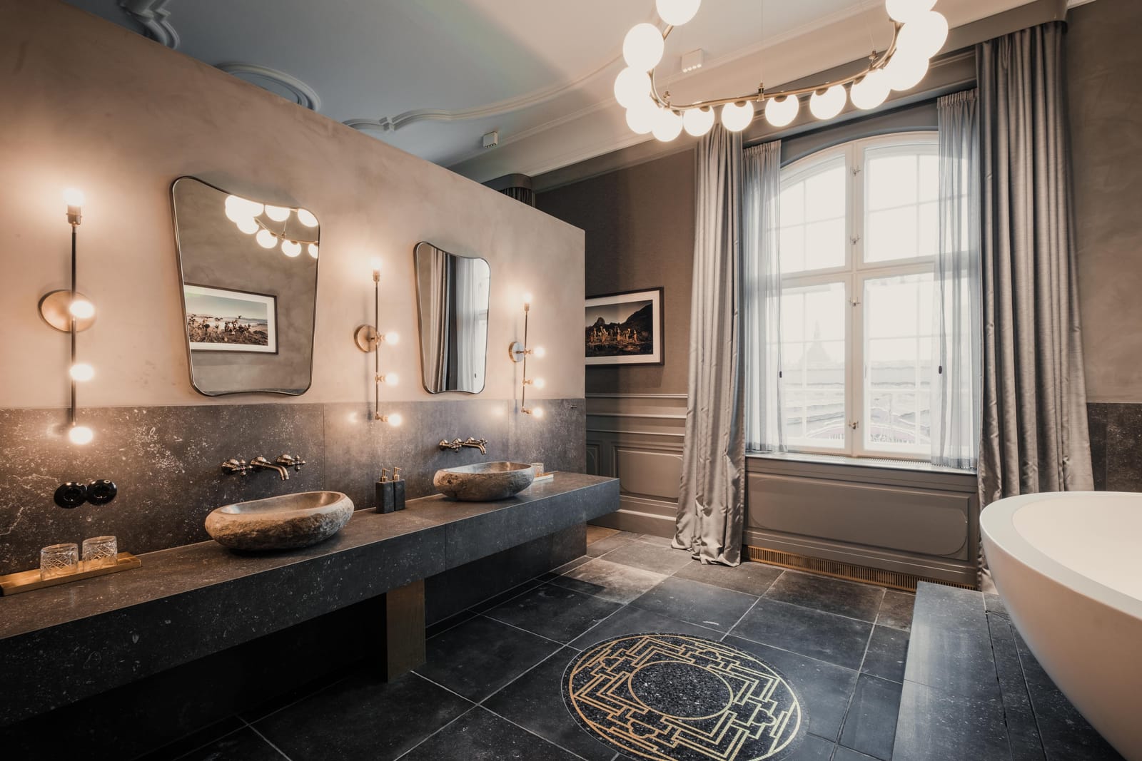 Bathroom with stone basins and soaking tub