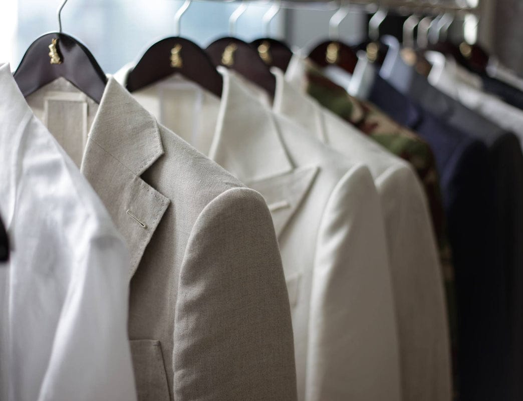 Finished jackets on the atelier rail