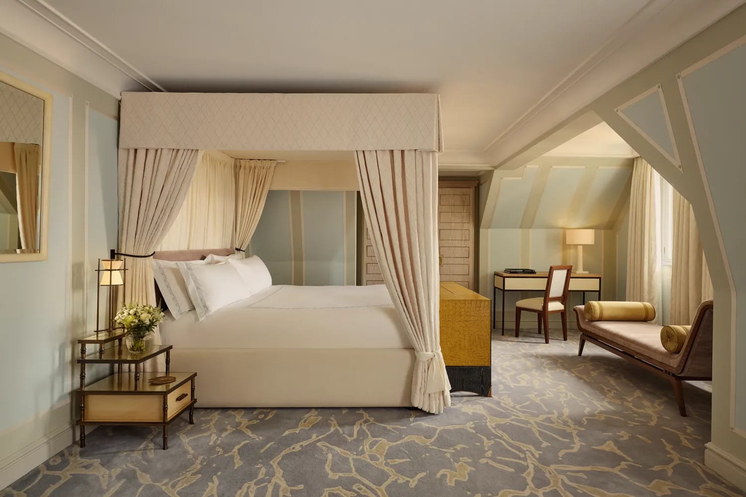 The four-poster in the main bedroom