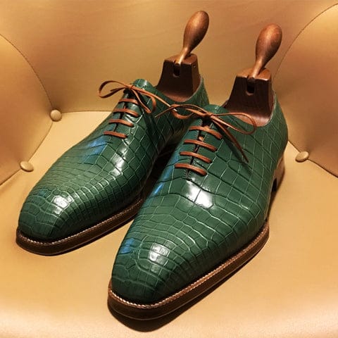 Wholecut Oxfords in green crocodile