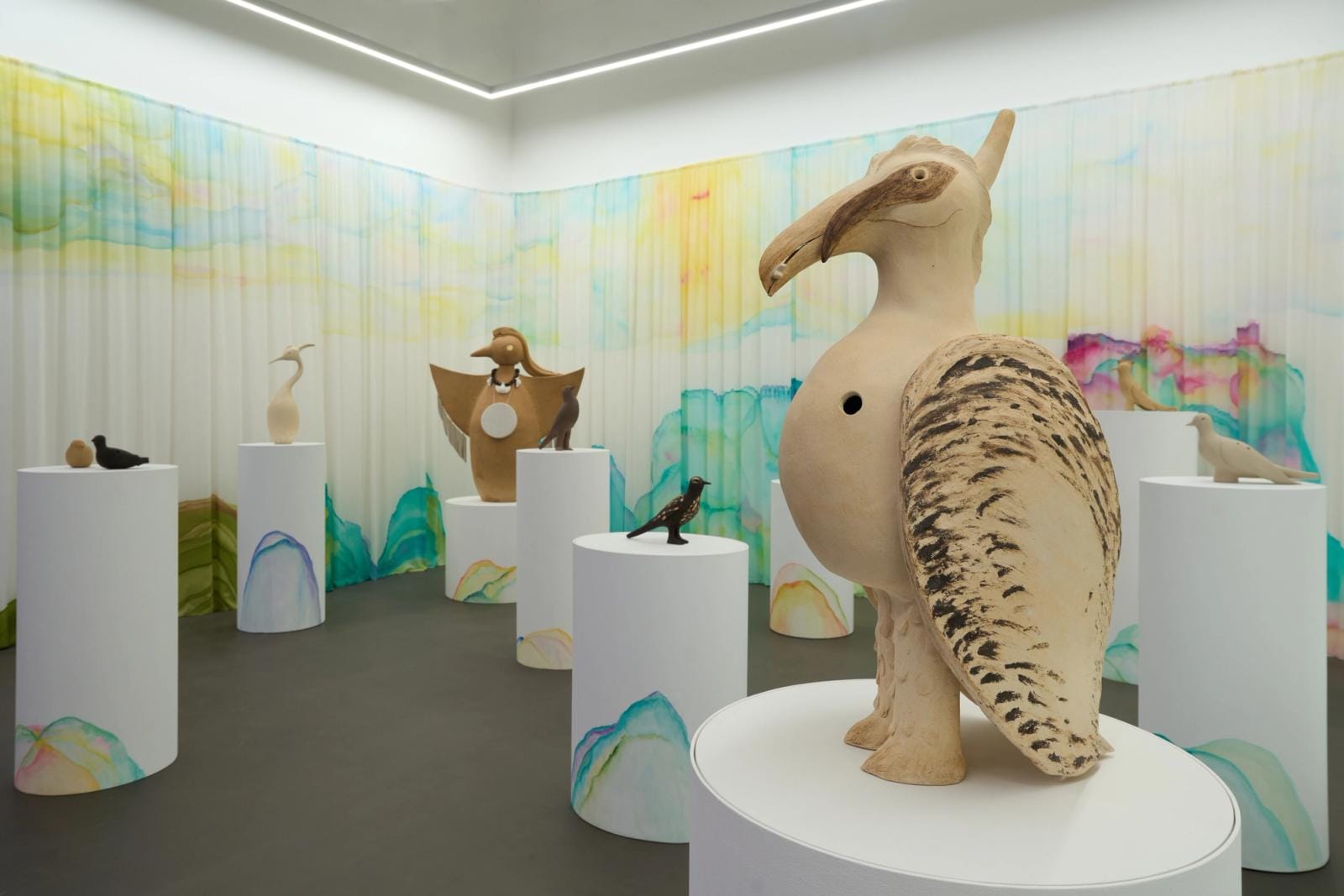 Vulture, a ceramic sound sculpture, with the flock behind