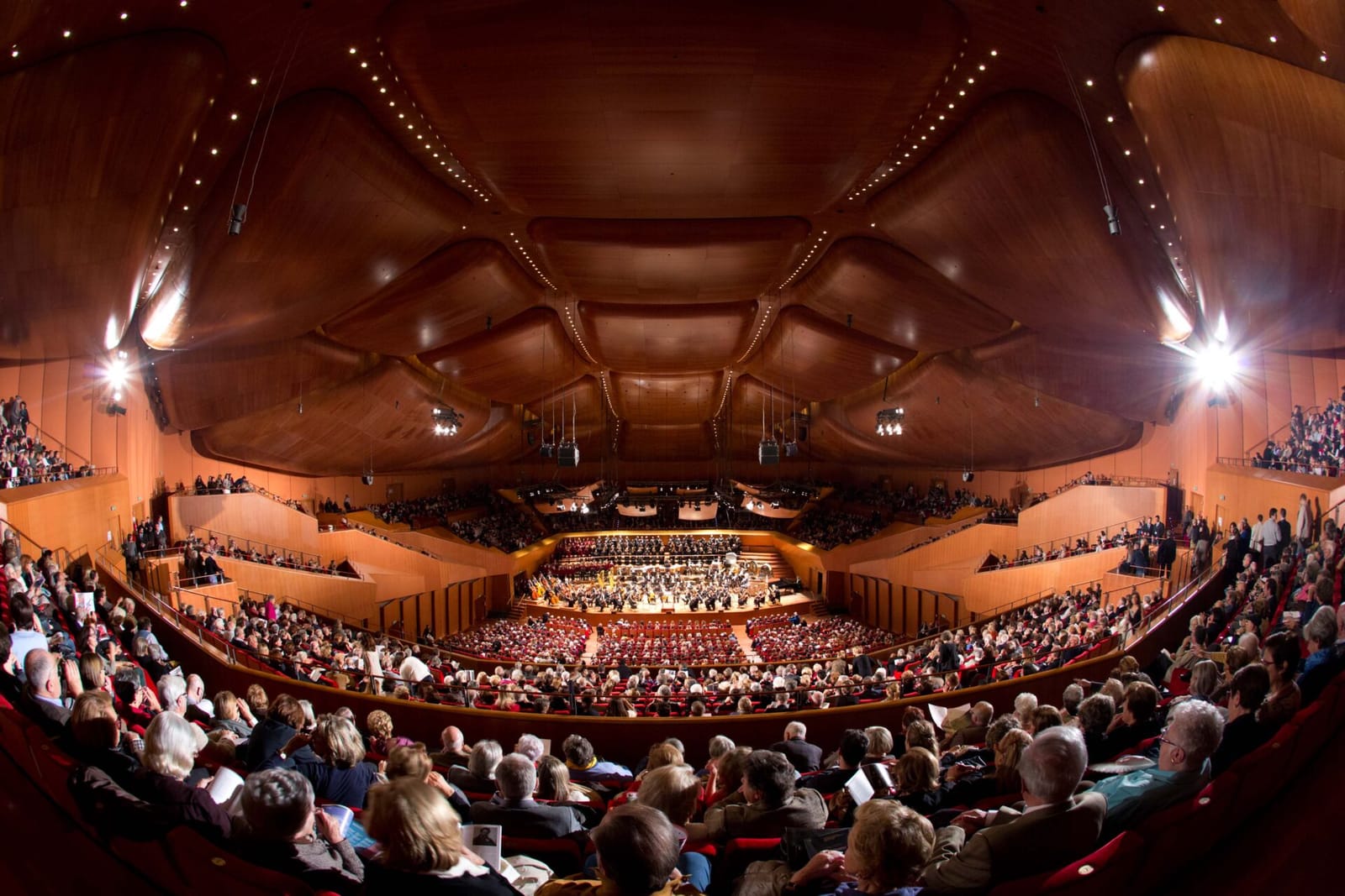 The hall from the upper tiers, orchestra and chorus on stage