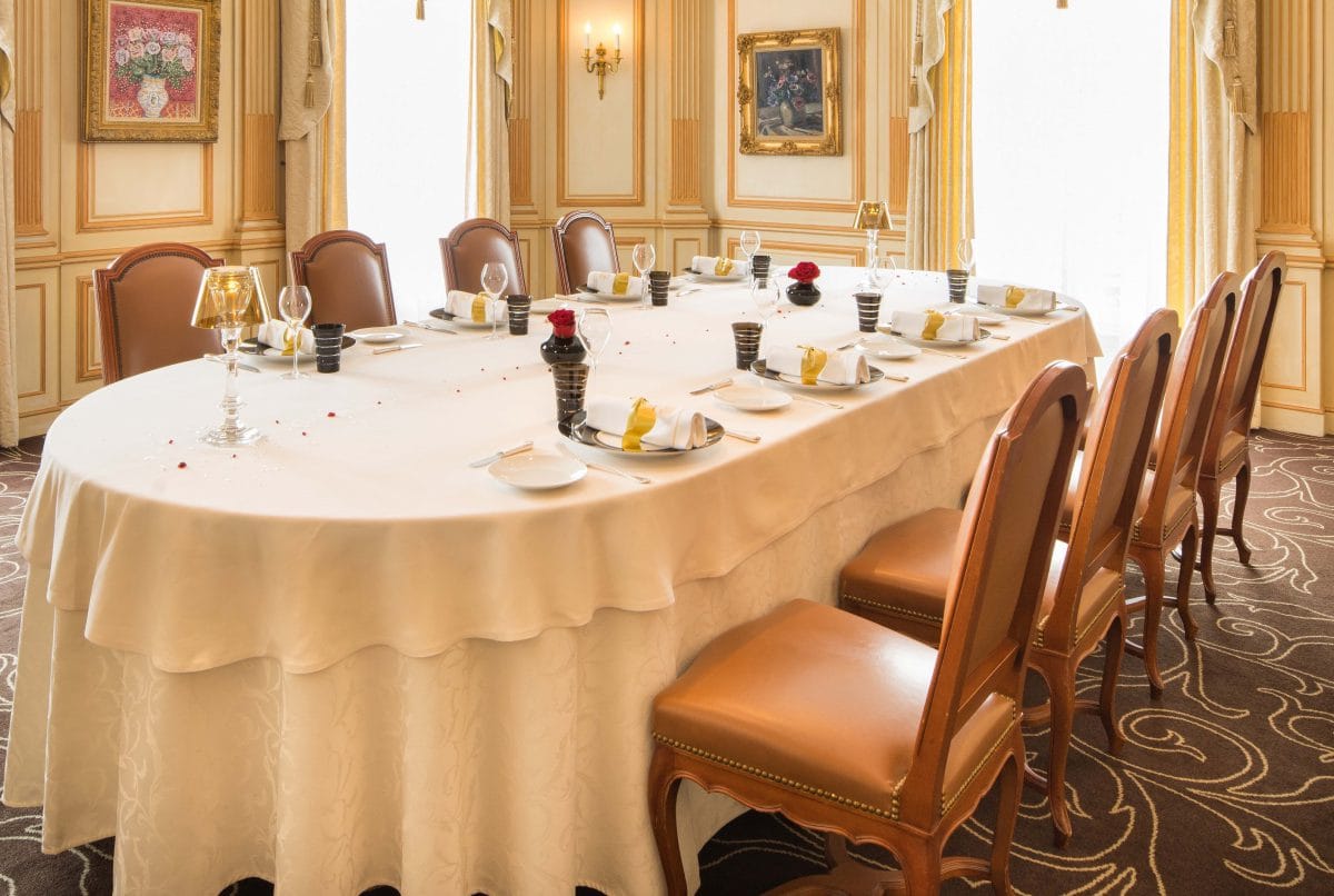 A salon with an oval table