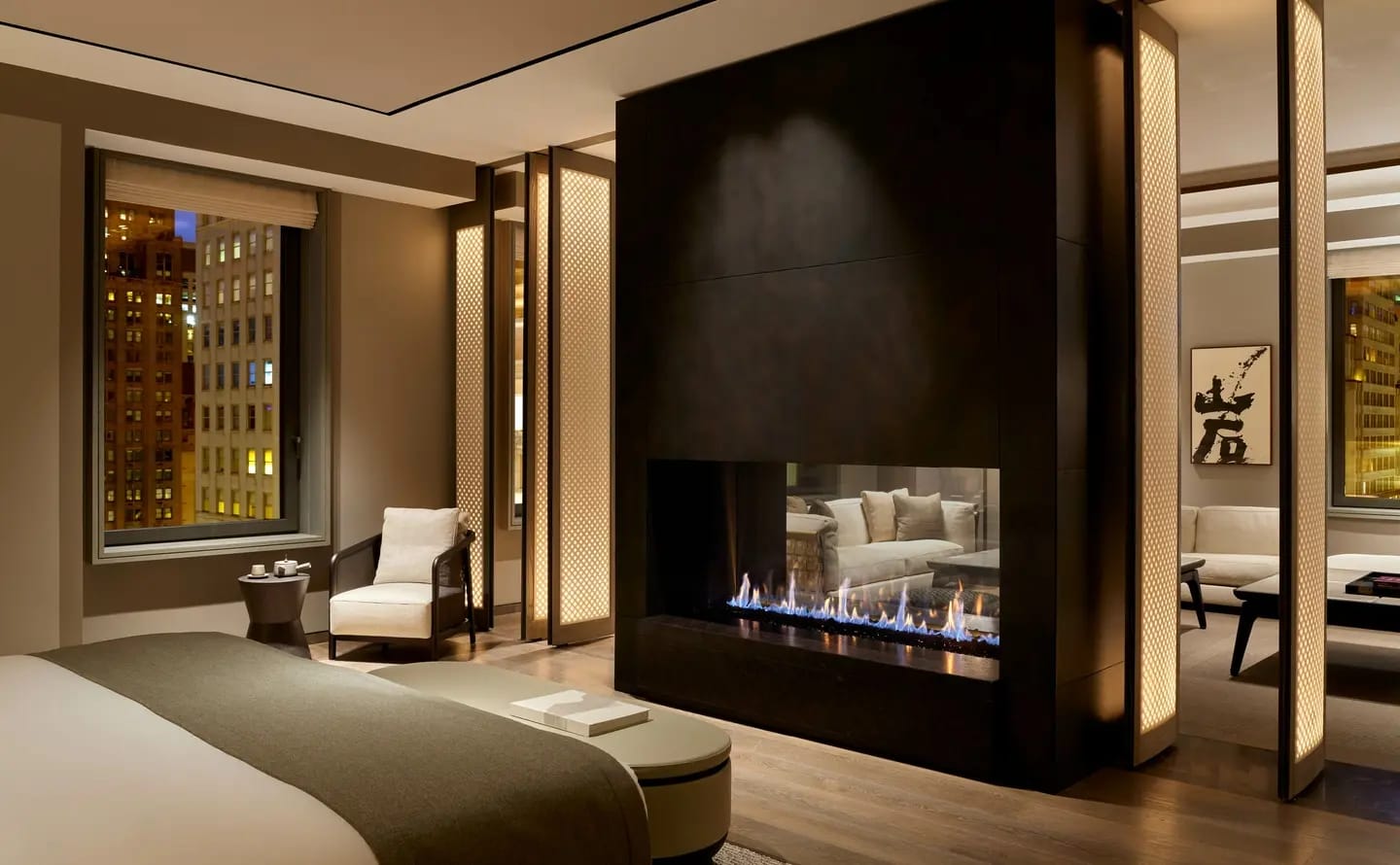 The bedroom and the two-sided fireplace