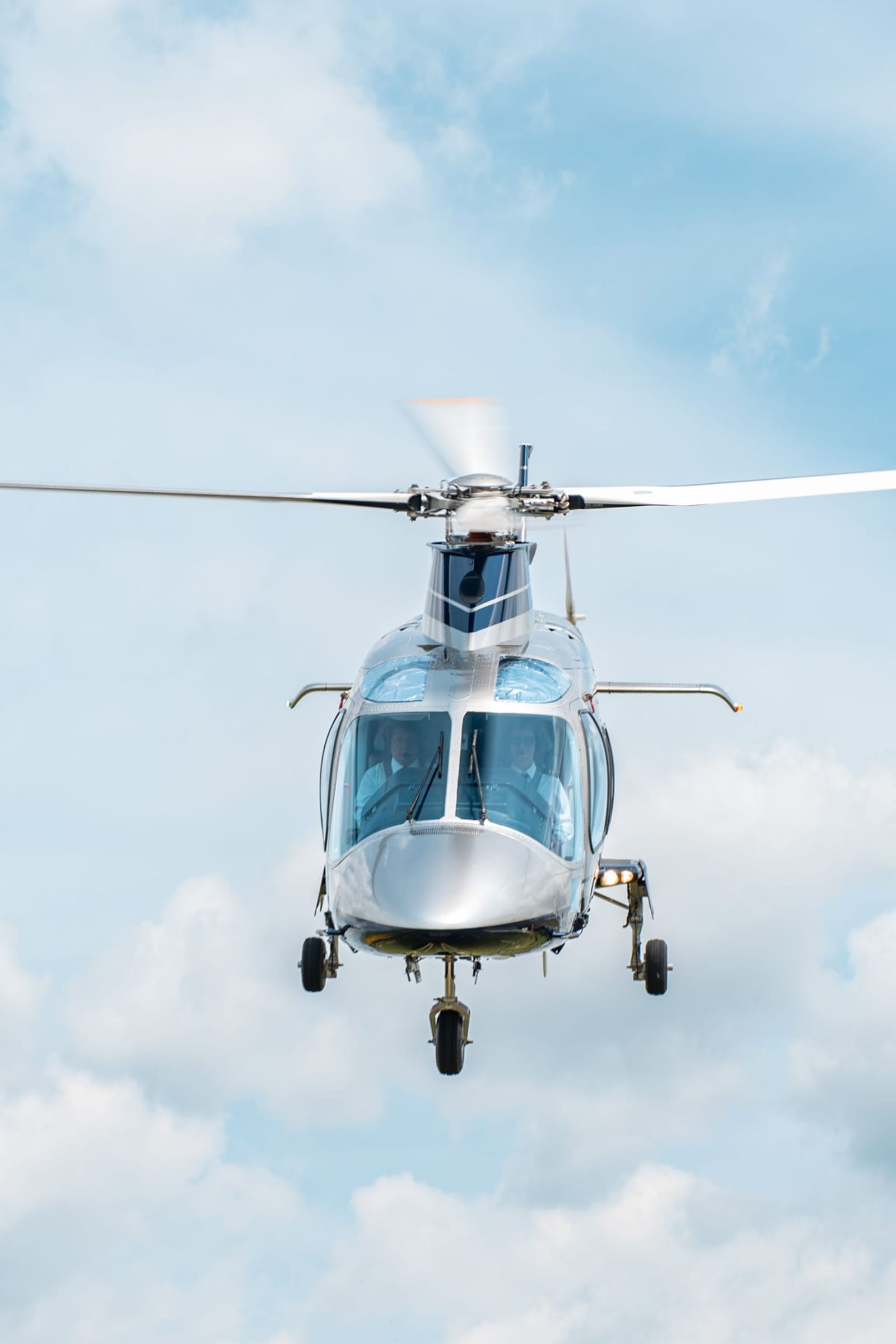 The AW109S in flight with two pilots