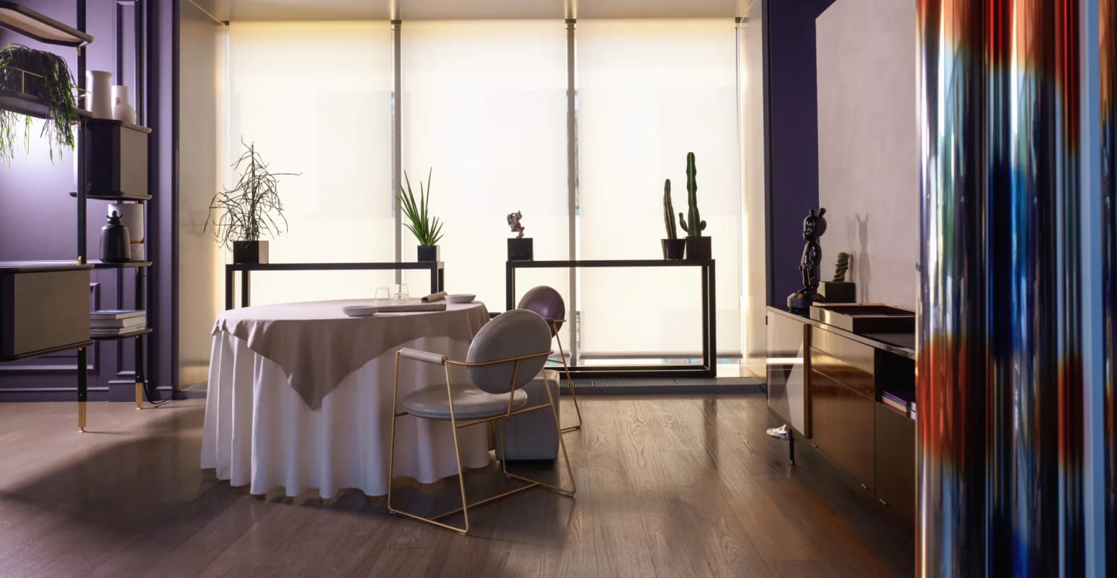 A table by the window screens
