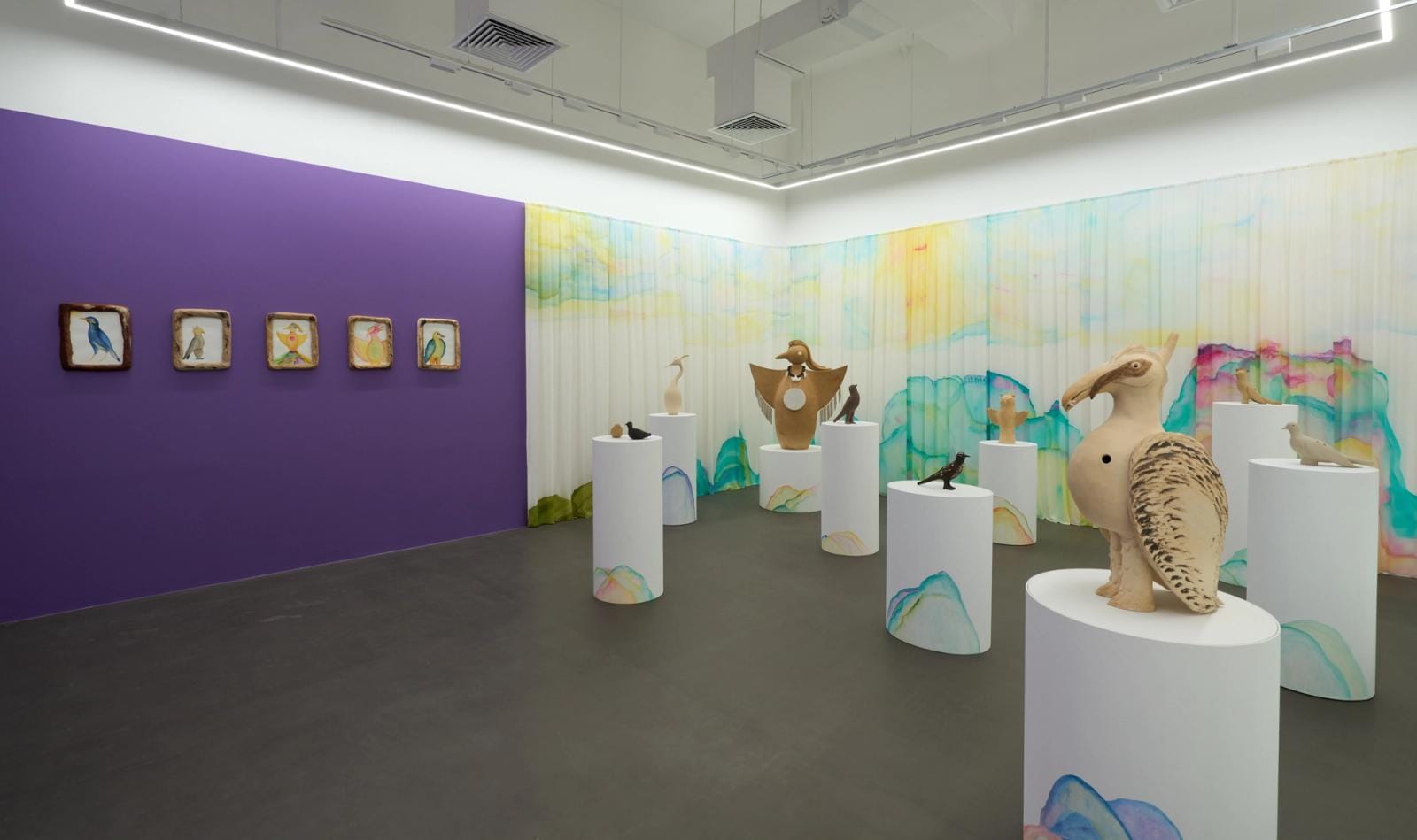 The ceramic birds and the watercolour curtain in the gallery