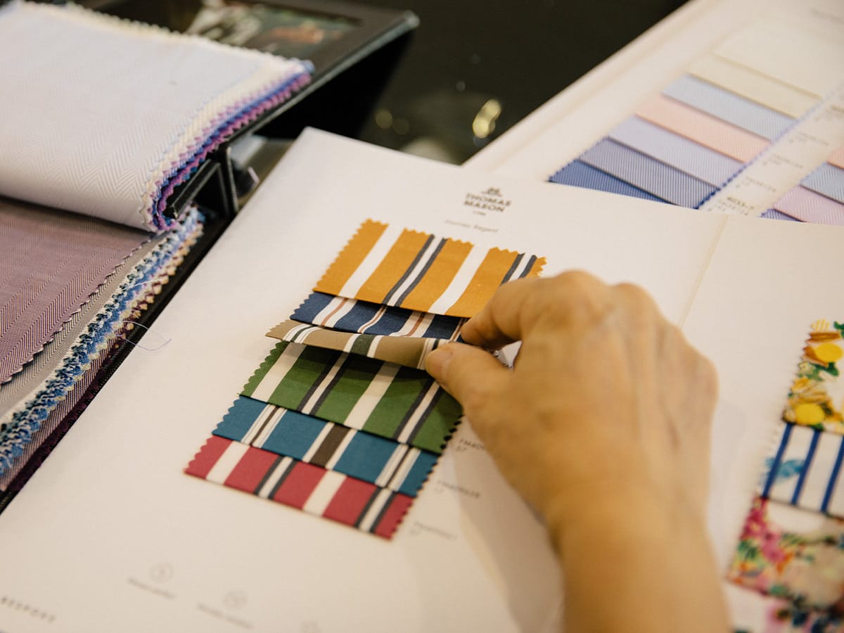 Shirting swatches at the fitting table