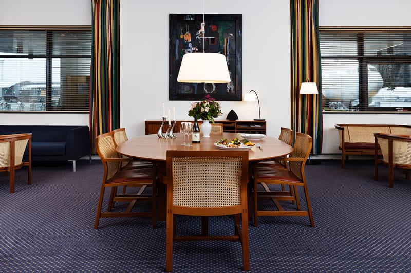 A private room in the lounge, laid for a meal