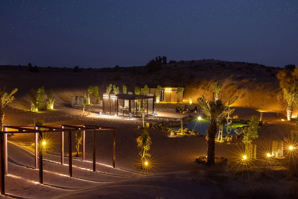 The camp lit at night