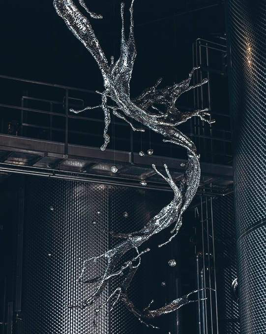 Sculpture among the steel tanks