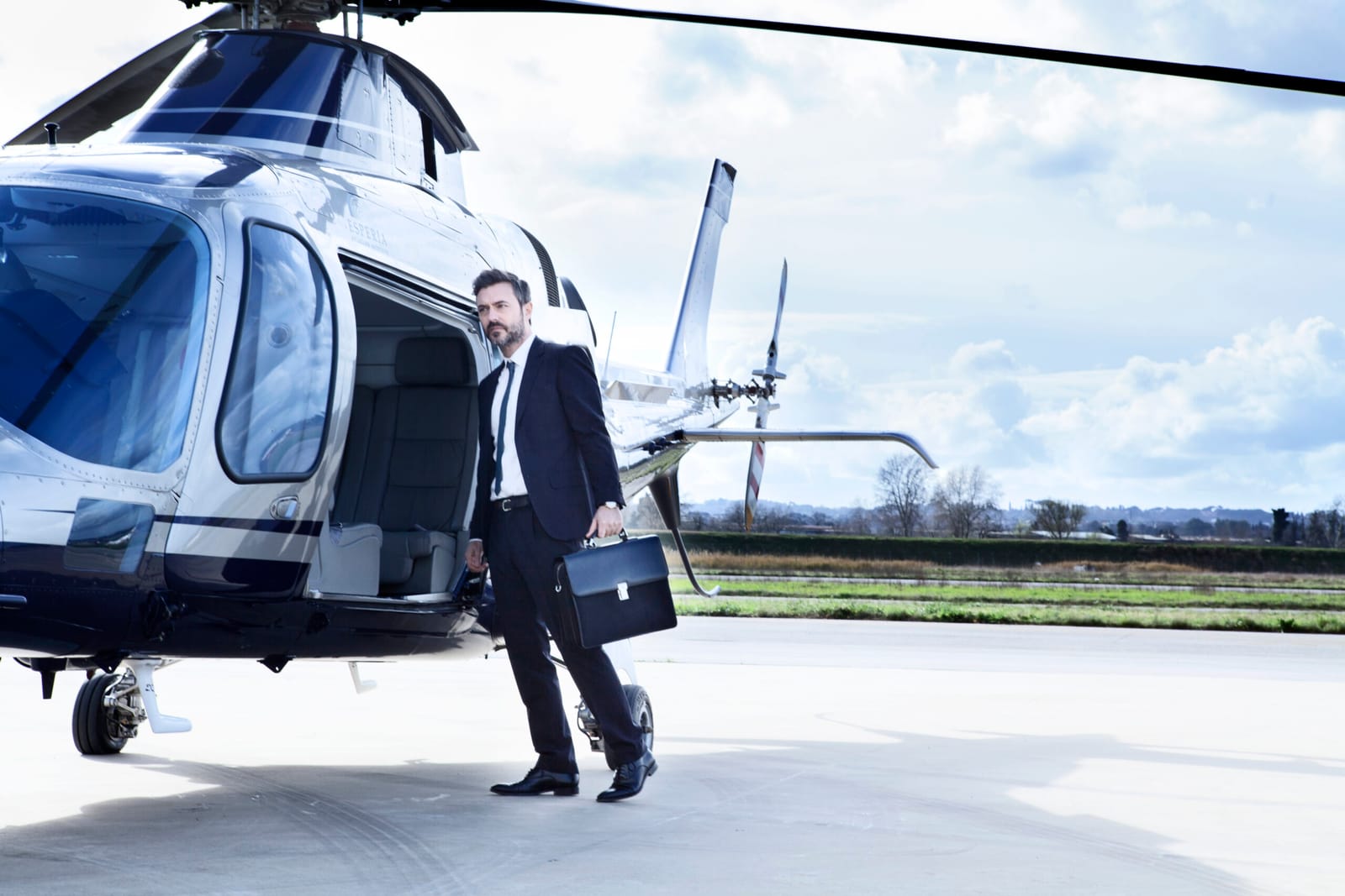 The AW109S on the apron, cabin door open