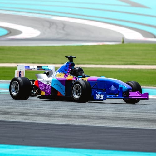 A car on the track at Yas Marina Circuit
