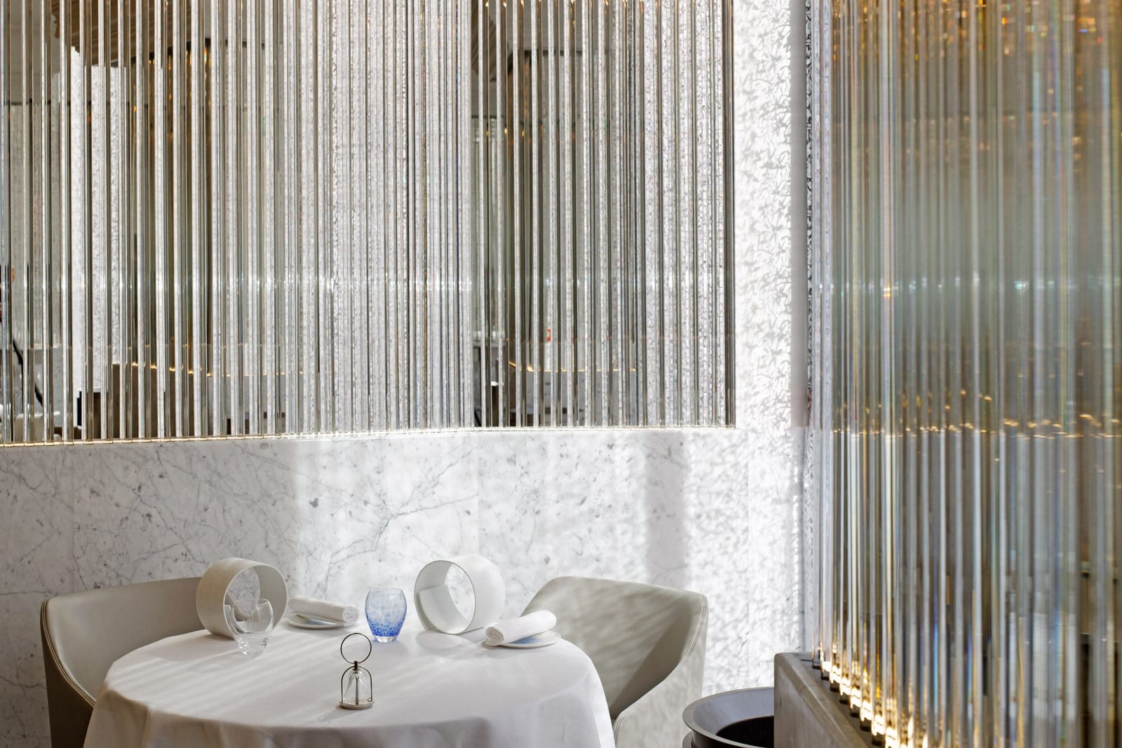 A table for two against glass and marble