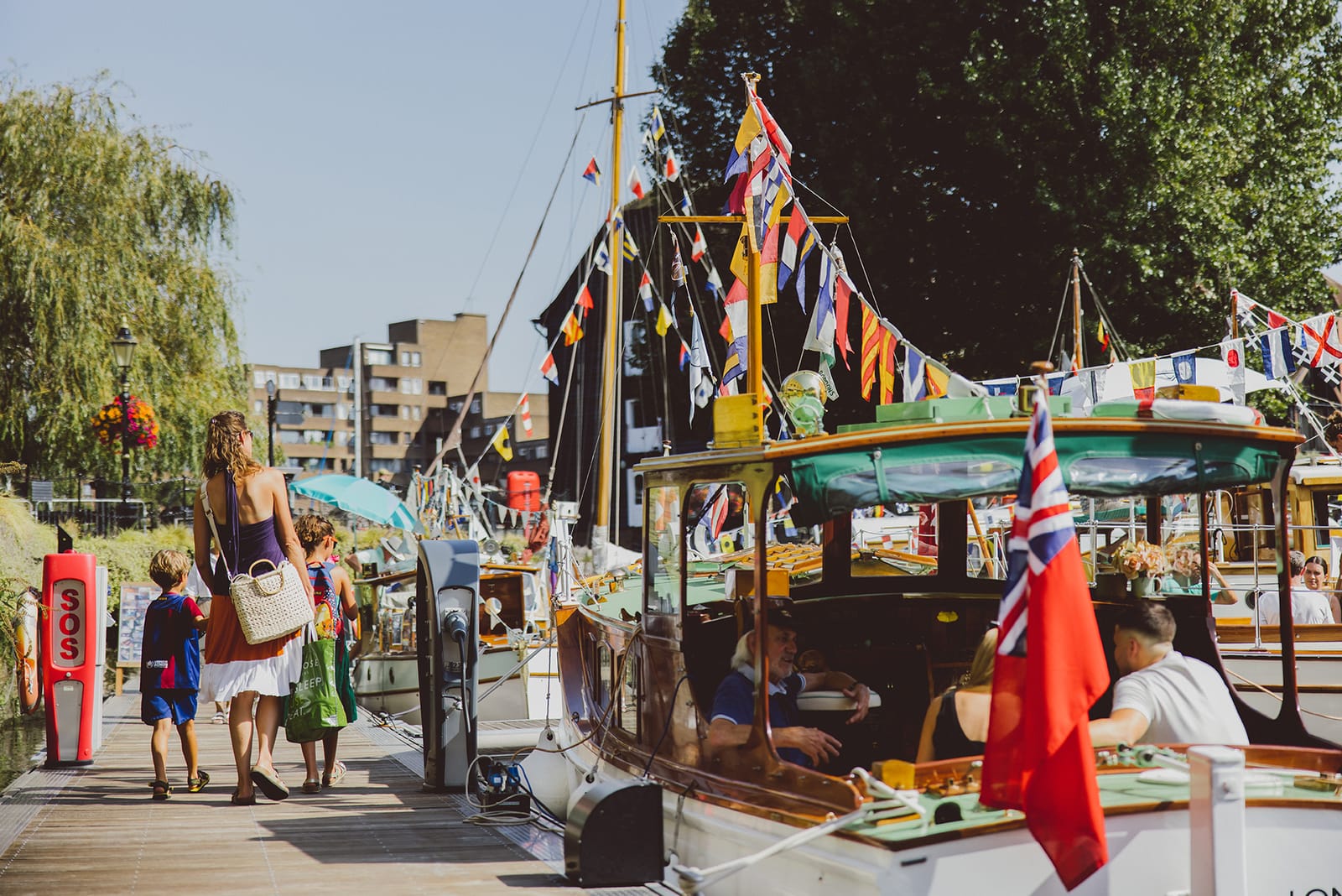 A pontoon in the marina, with classic boats alongside