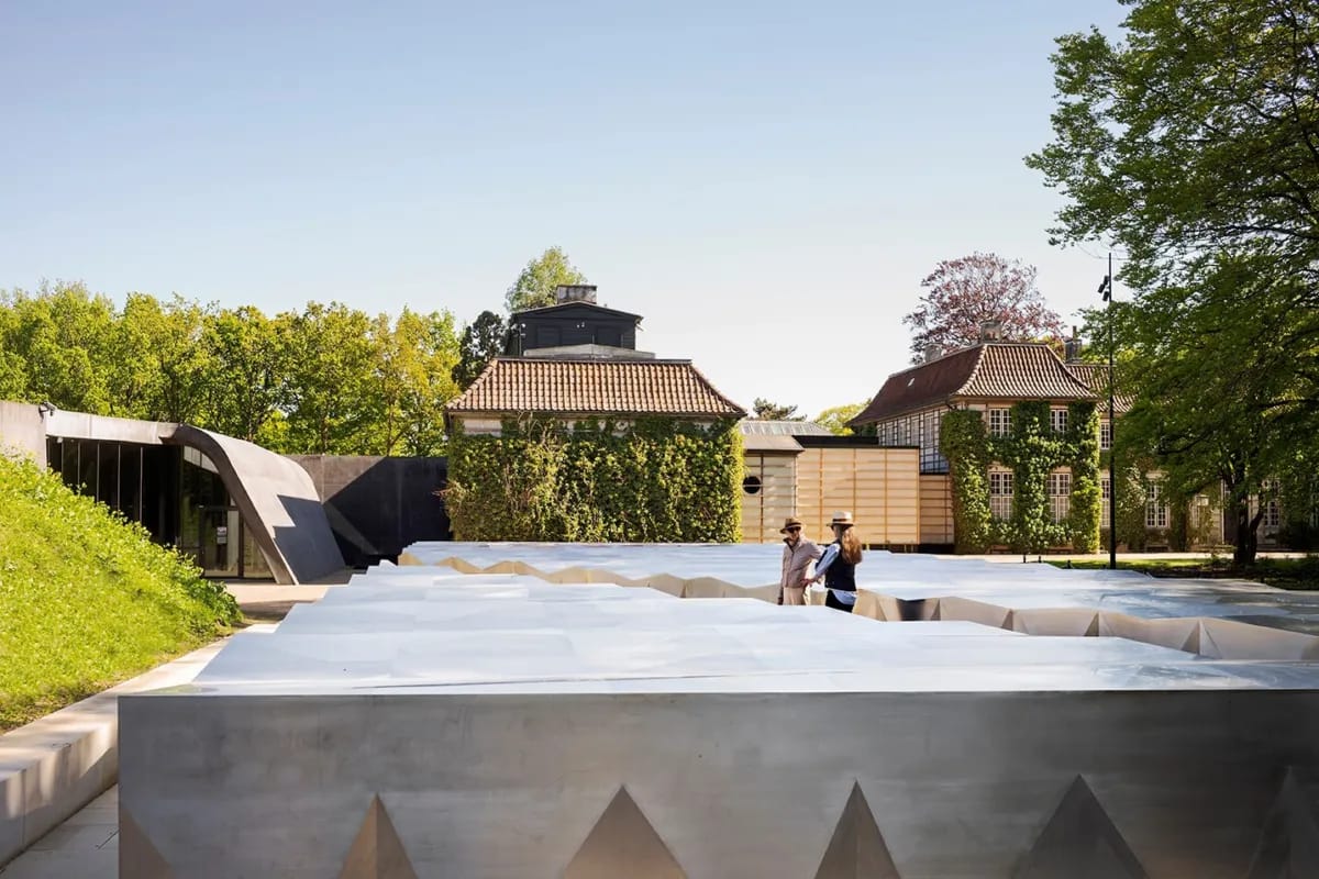 The Snøhetta roof, the Hadid building and the manor house