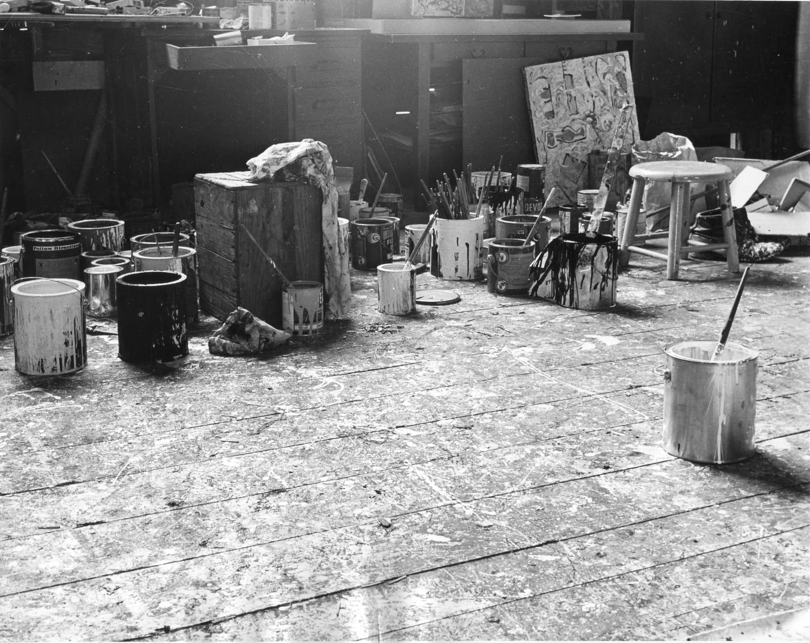 Paint cans on the studio floor