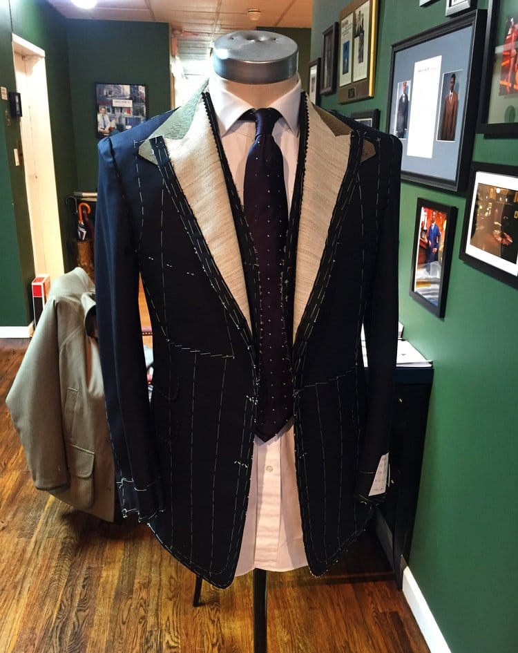 A basted jacket in the atelier
